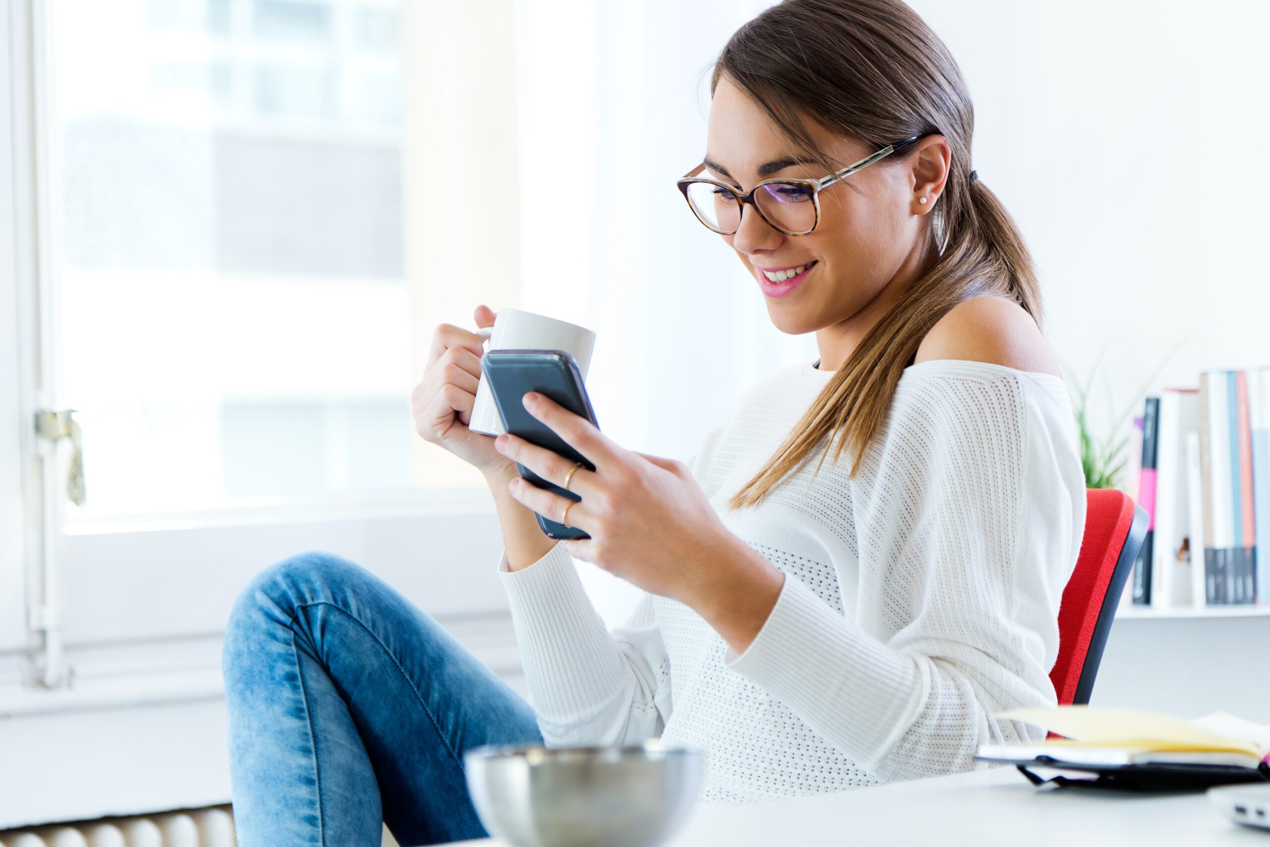 Young woman using her smartphone.